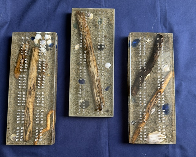 Featured image for “Drifting-a-Ray Beach Designs introduces our Coastal Collection Cribbage Boards—where the timeless game of cribbage meets the beauty of the shore.”